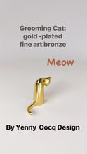 Load and play video in Gallery viewer, Grooming Cat in Gold