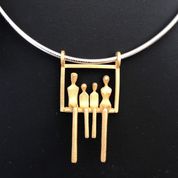 Load image into Gallery viewer, A couple and two children sitting close in a swing pendant in gold.