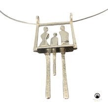 Load image into Gallery viewer, A mother and father with child in a swing in silver. Pendant shown from below