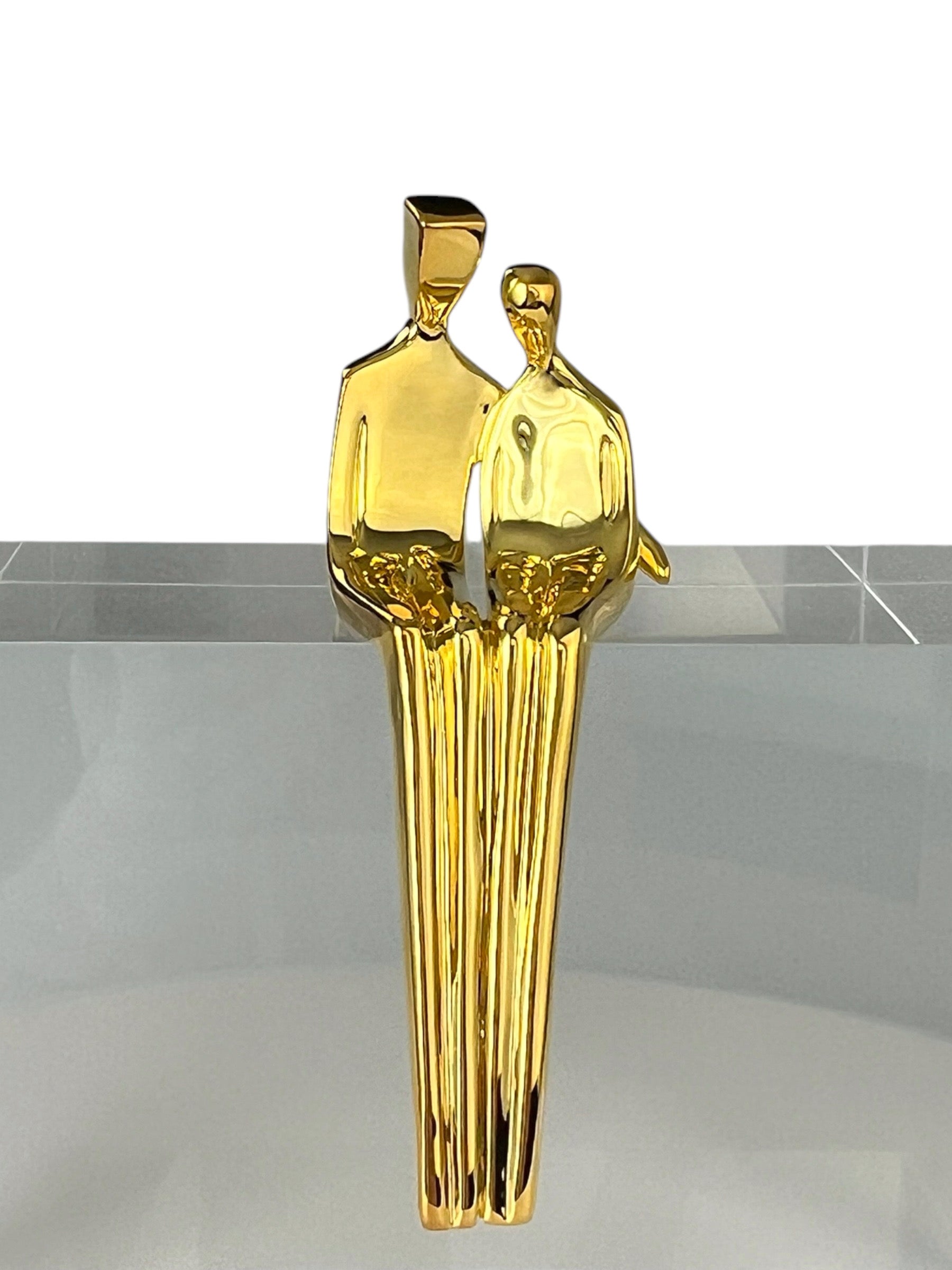 Close to Me sculpture in gold