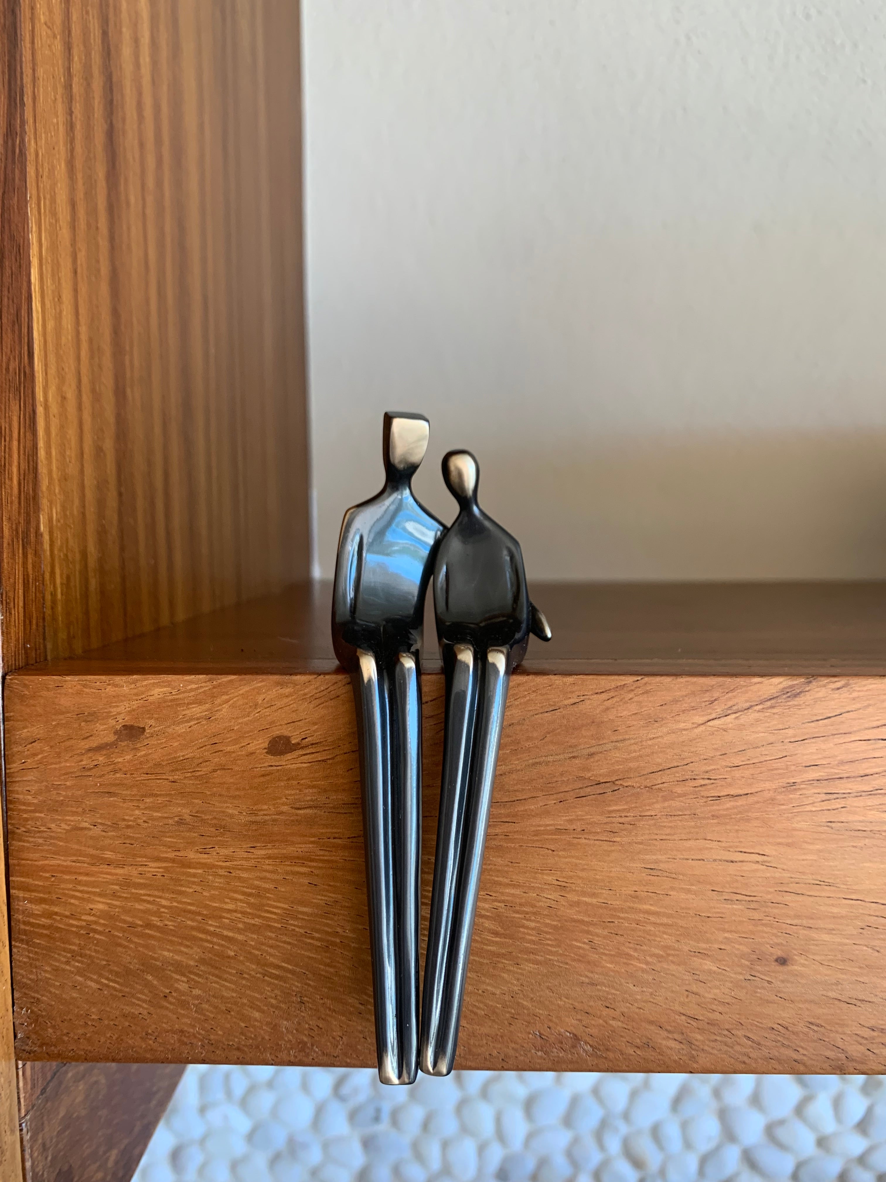 Close to Me sculpture in bronze