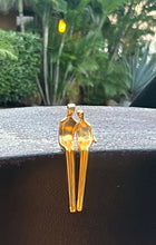 Load image into Gallery viewer, Close to Me sculpture in gold
