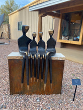 Load image into Gallery viewer, Family of Four outdoor bronze sculpture
