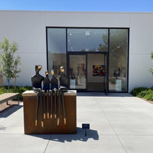 Load image into Gallery viewer, Family of Four outdoor bronze sculpture
