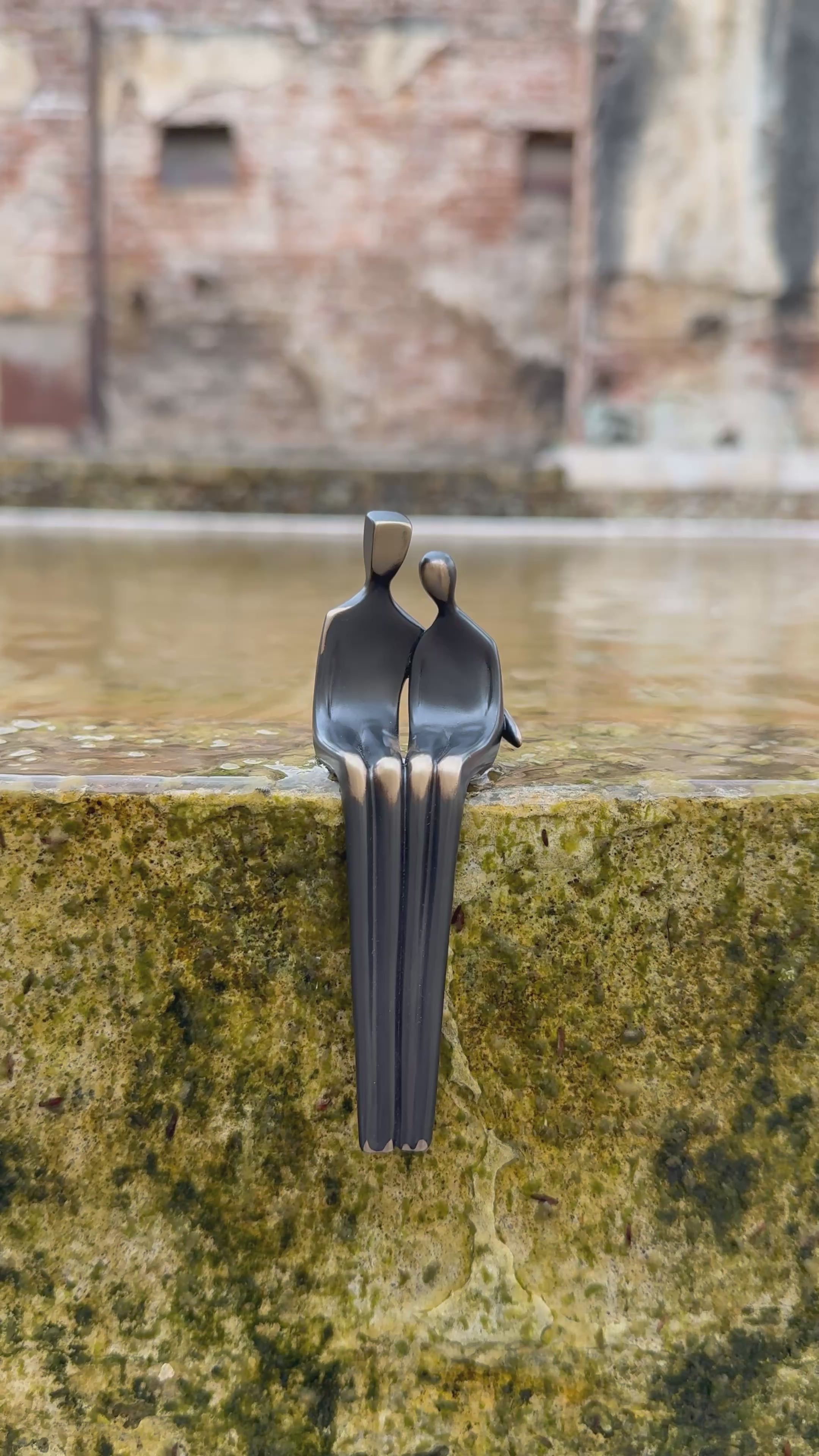 Close to Me sculpture in bronze
