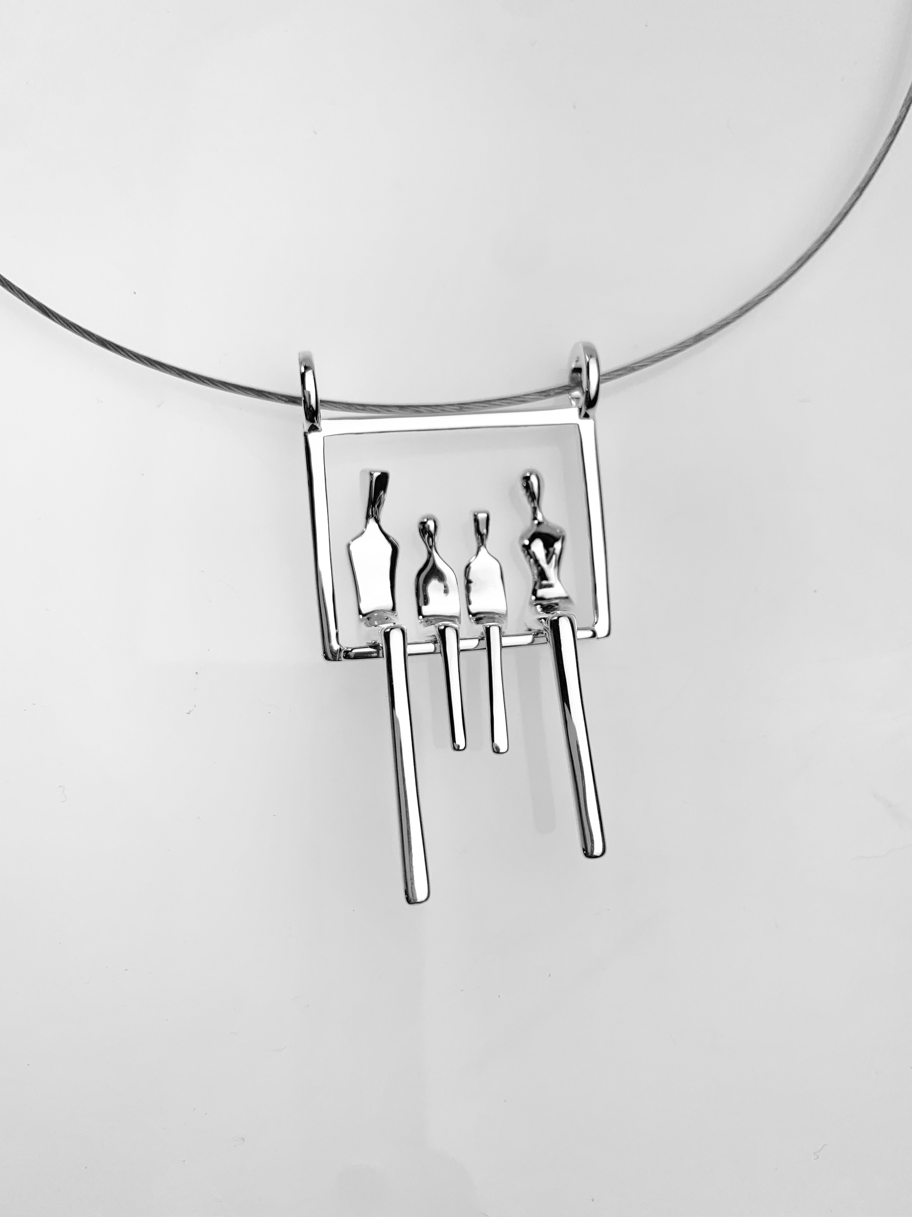 Family of four pendant in silver