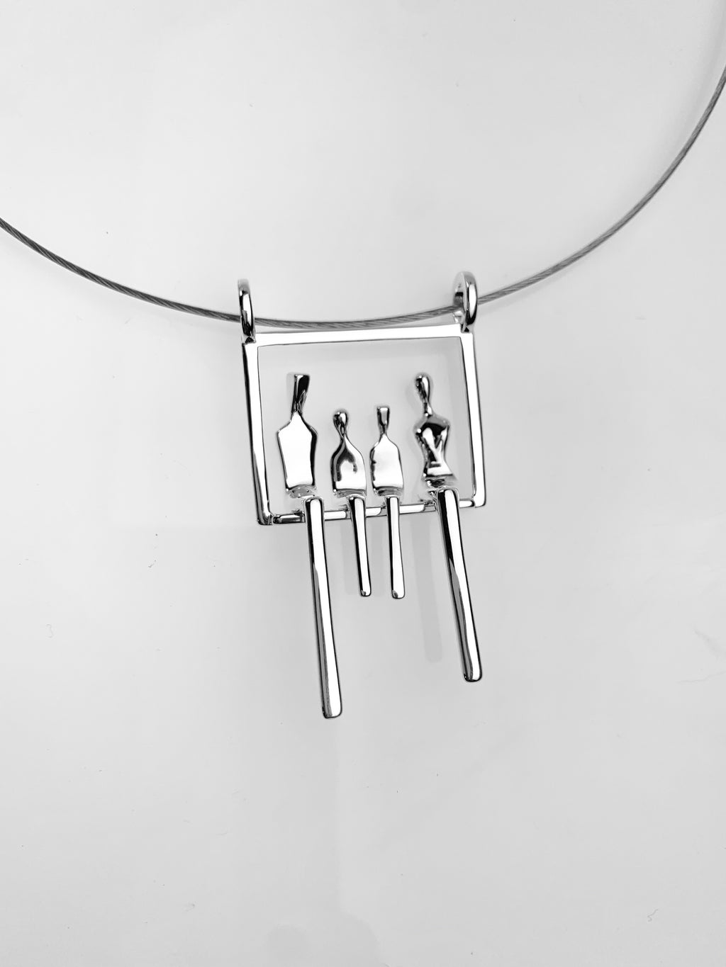 Family of four pendant in silver