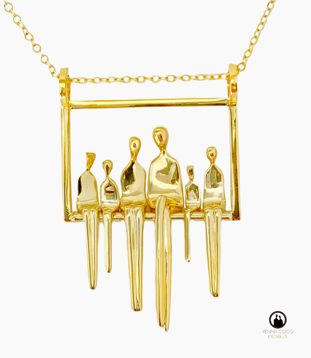 Mother sitting with her small clan of children in a swing. A pendant made of gold plated silver.