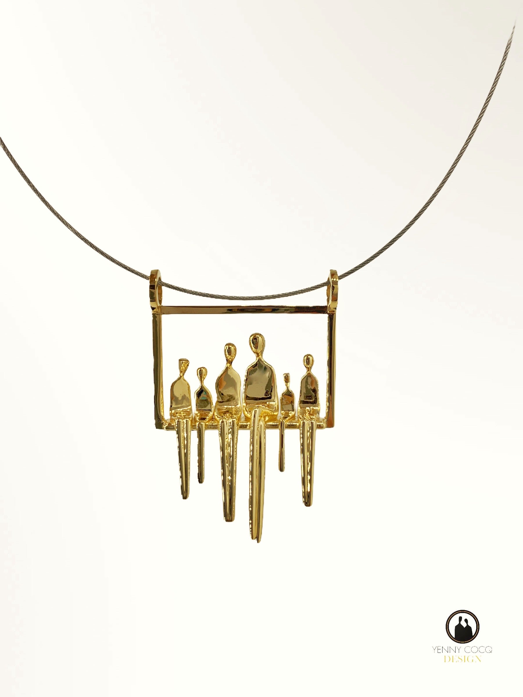 Mother sitting with her small clan of children in a swing. A pendant made of gold plated silver.